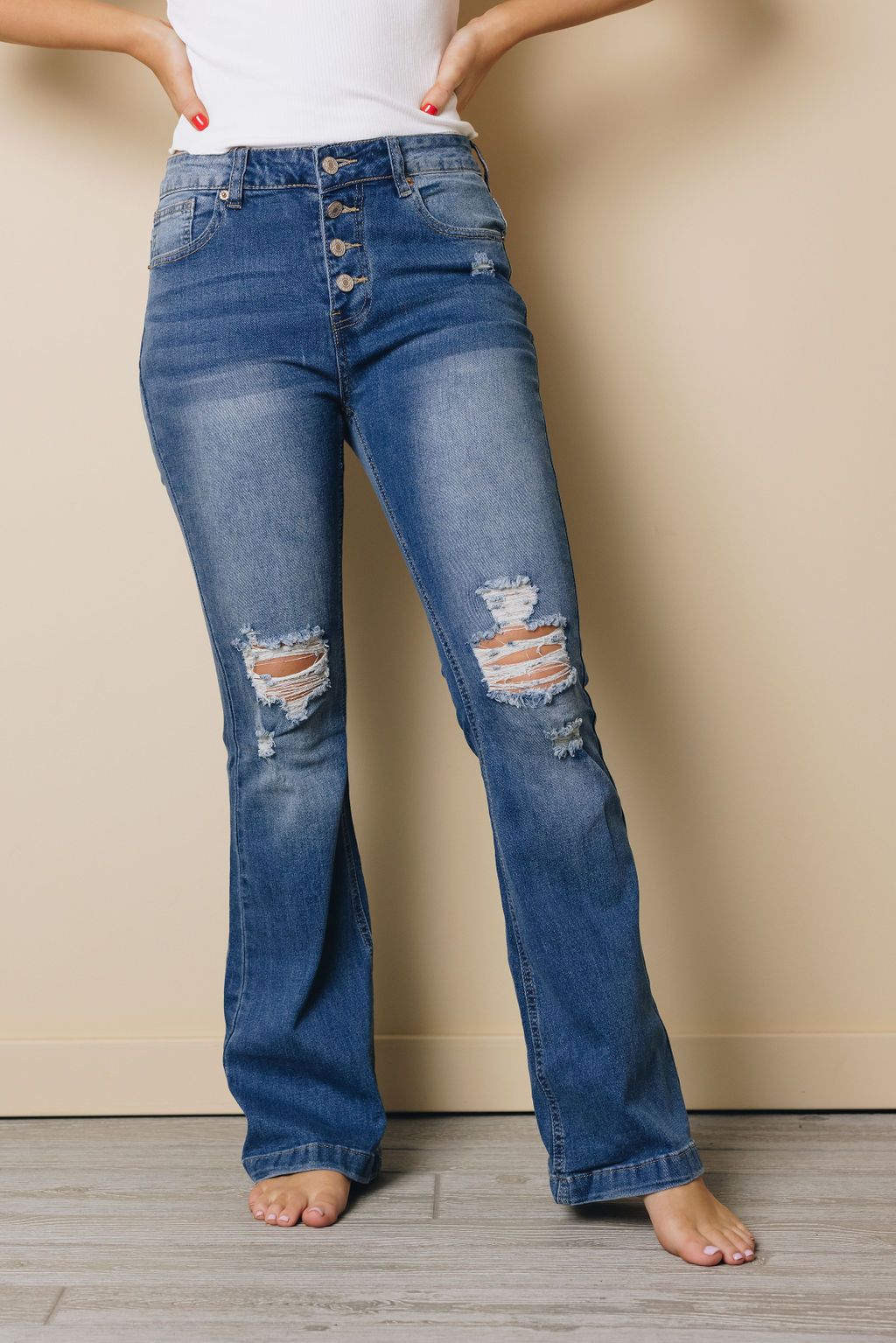 distressed flare bottom jeans